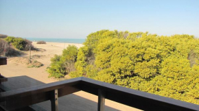 Отель Departamento Villa Gesell Norte sobre Playa y 310 Vista al Mar  Вилла Гесель